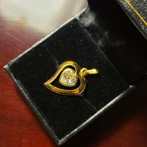 14K gold heart shaped frame pendant with center stone